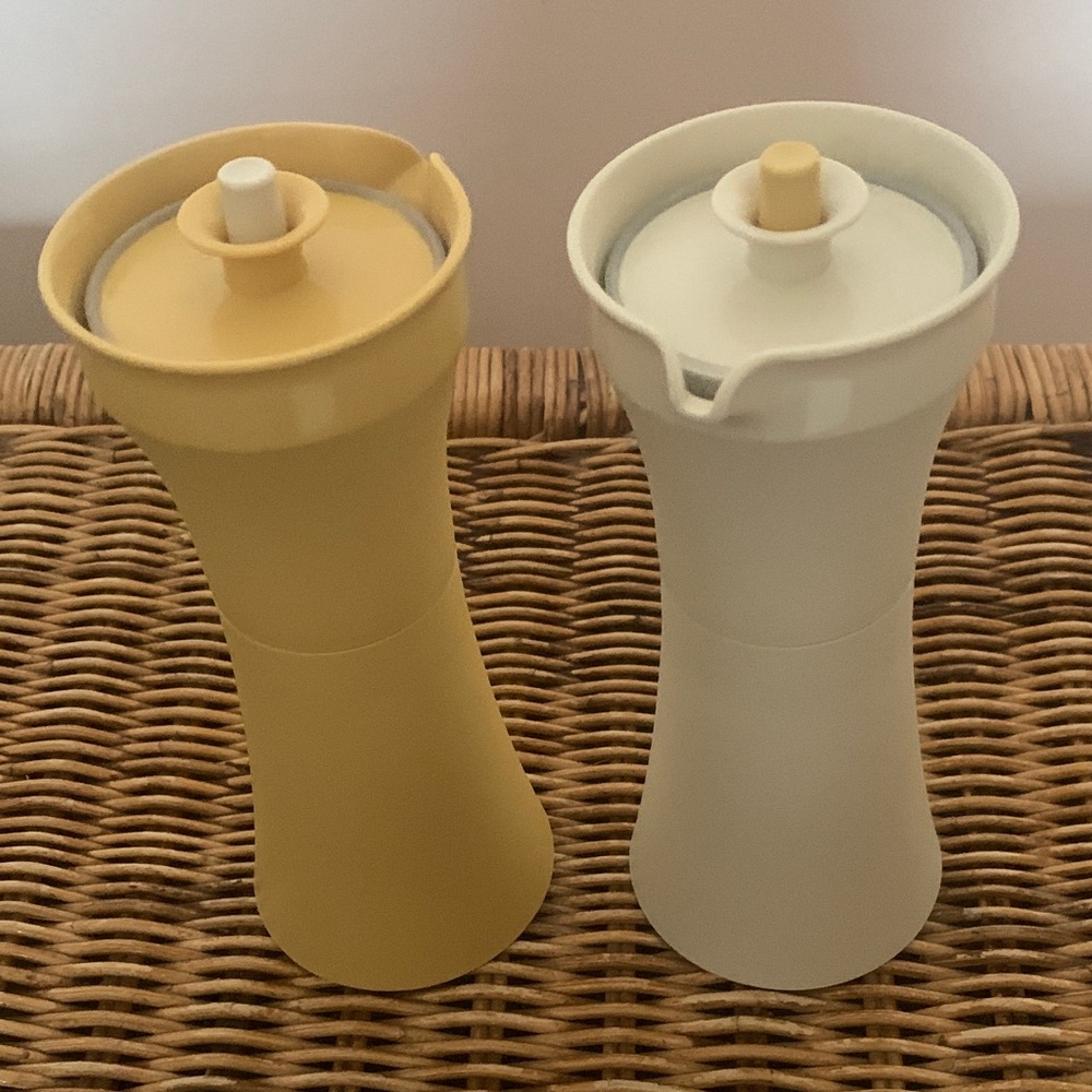 Vintage Tupperware oil and vinegar cruets.